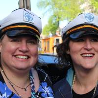 two women smile on boat tour